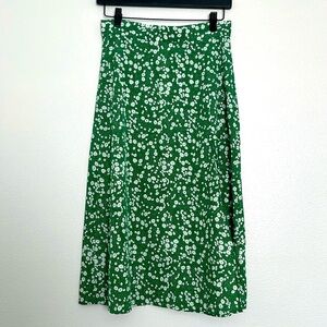Midi skirt with slit green with white floral pattern